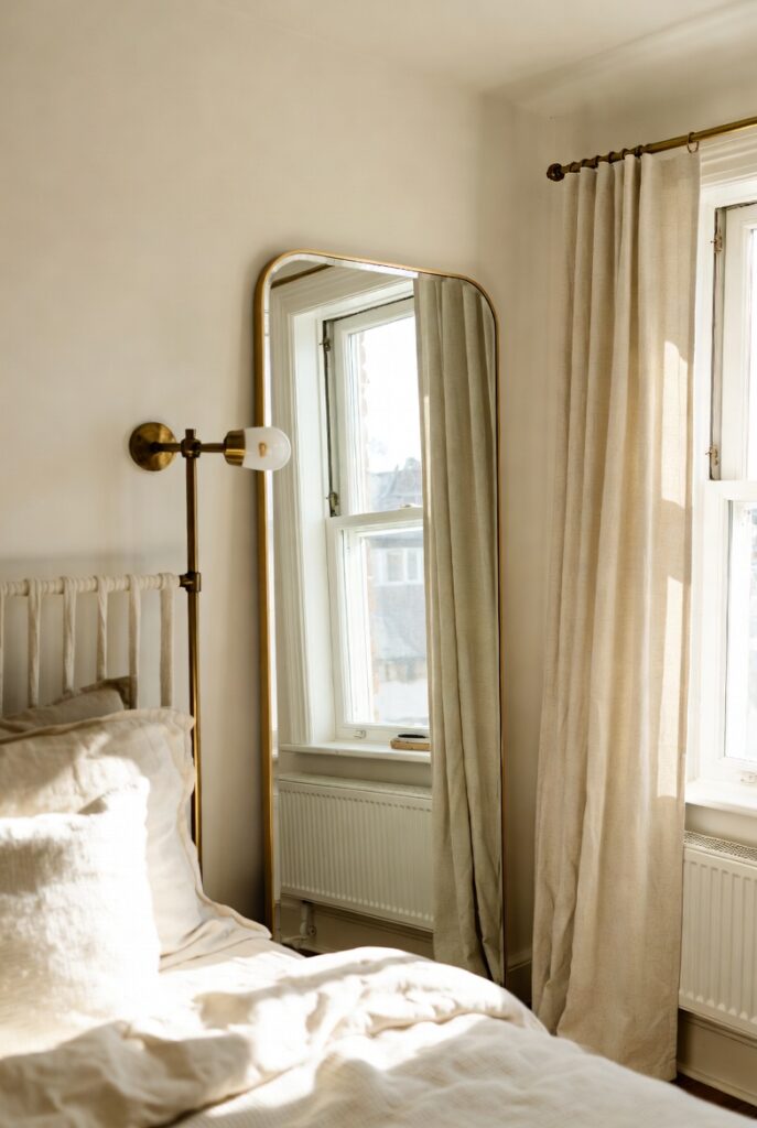 Add a Statement Mirror to Expand the Room Visually